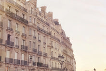 Load image into Gallery viewer, Golden Haussmann buildings along the seine river in Paris. Afternoon sunset pastels 
