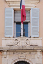 Load image into Gallery viewer, Doorway and window and shutters, French flag, at the Hôtel,de Ville town hall, antibes France Côte d’Azur south of France French Riviera 
