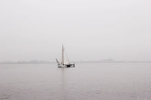 Load image into Gallery viewer, sailboat on the Gouwzee lake in the netherlands spring morning mist grey wall art photography
